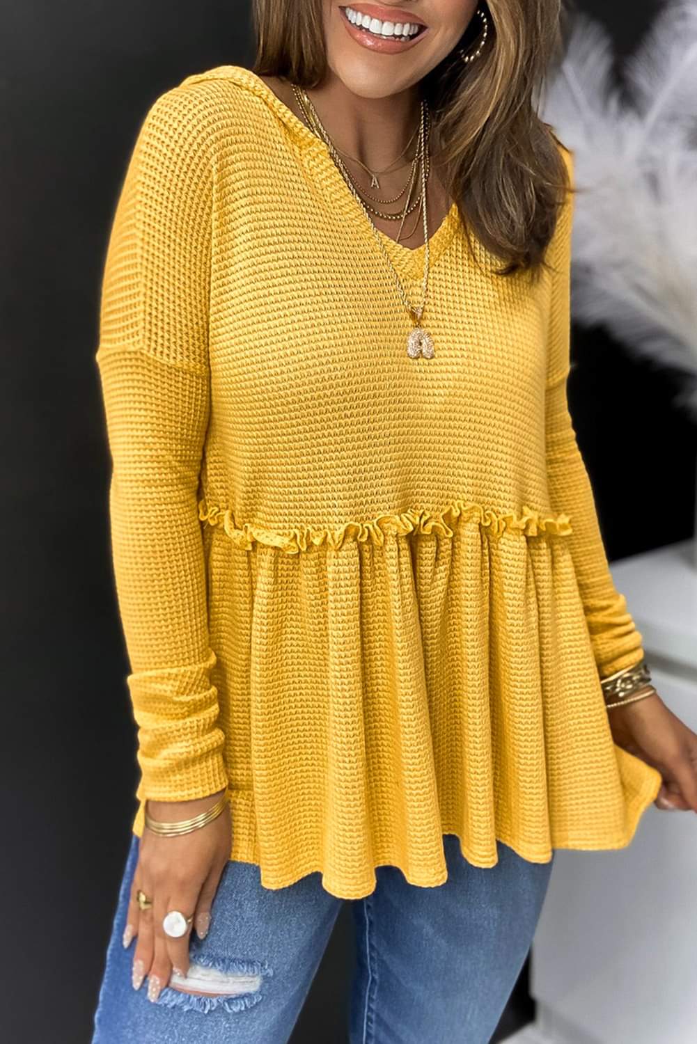 Yellow hooded blouse