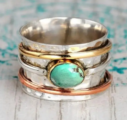 Metal and turquoise ring