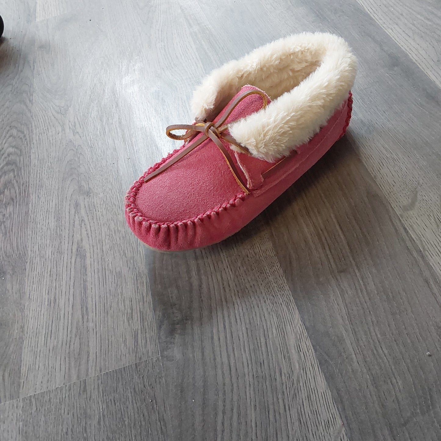 Pink moccasins with fur